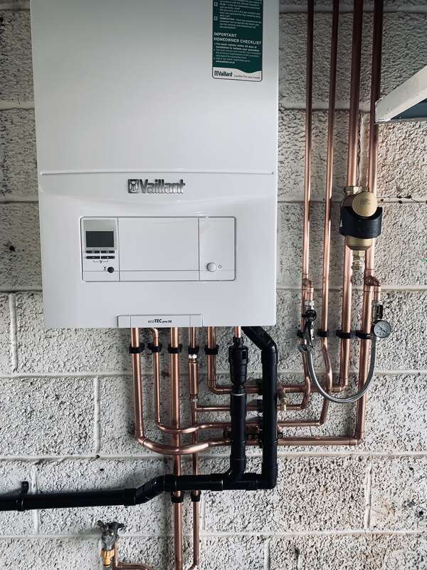 HeatCool engineer completing boiler installation in Kent