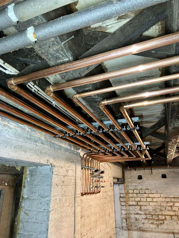 Neat copper pipework heating installation Kent